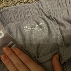 Under armor shorts with pockets and pretty purple color